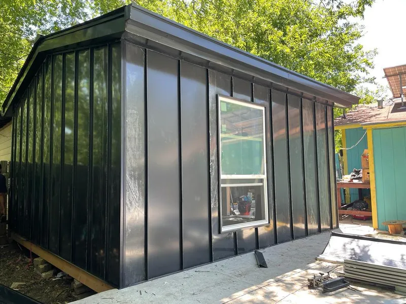 Black standing seam metal wall panels for Metal Roof Installation in Ottawa