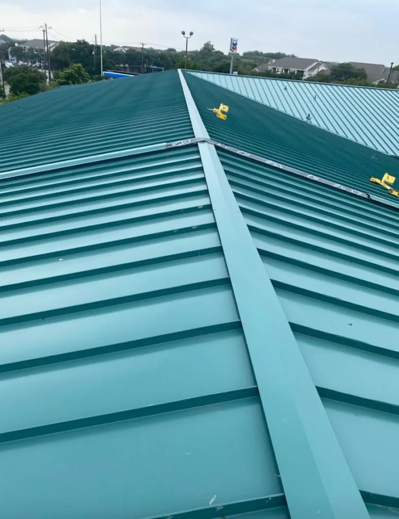 Green commercial metal roof ridge and valley for Metal Roof Repair in Ottawa