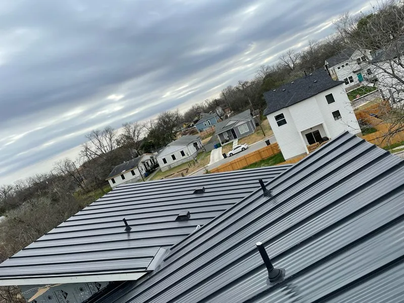 Standing seam metal roof panels with vents for Skylight Repair in Ottawa